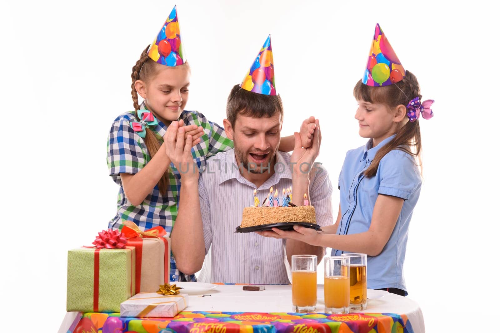 Dad is very happy about the festive sweet surprise prepared by the children