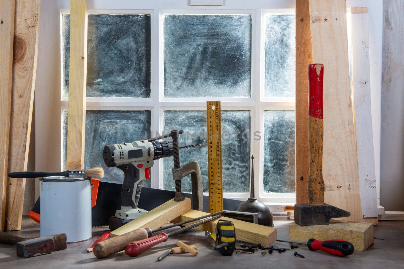 some tools of carpenter in the workshop, near the window