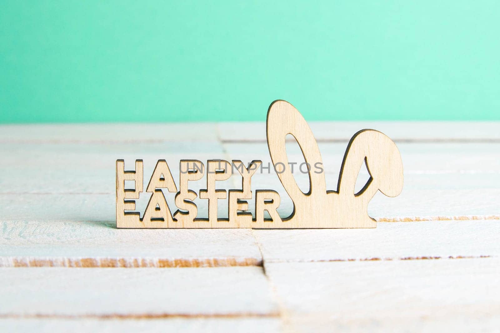 Easter holiday background. Easter bunny, eggs and text Happy Easter. Minimal modern concept.