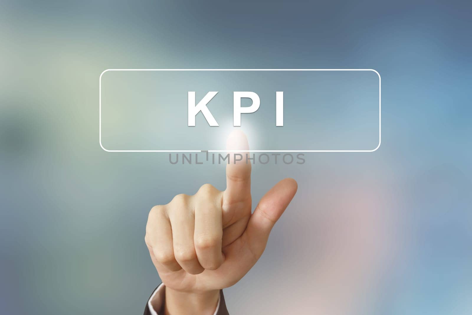 hand pushing KPI or Key Performance Indicator button