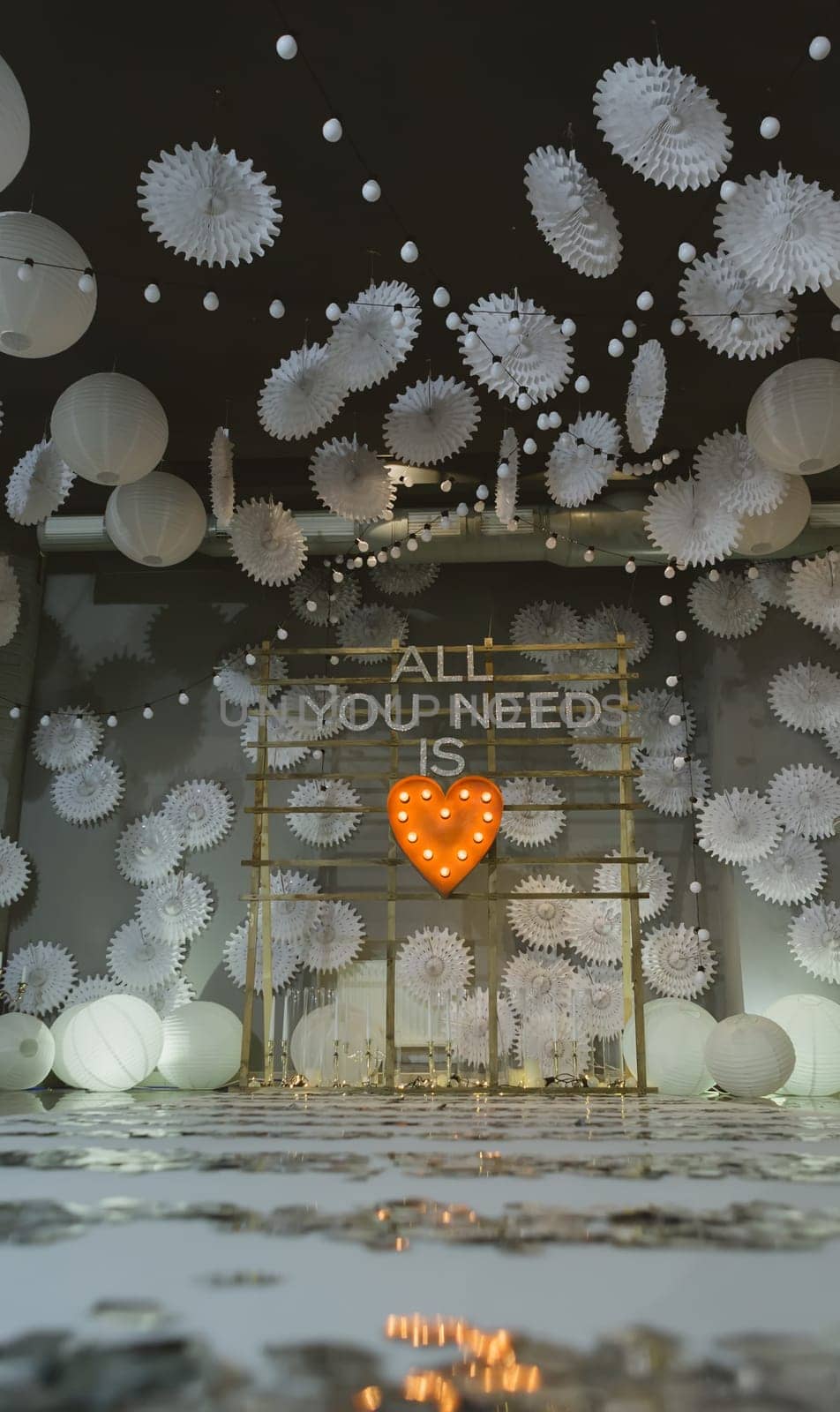 wooden arch and chairs at wedding ceremony