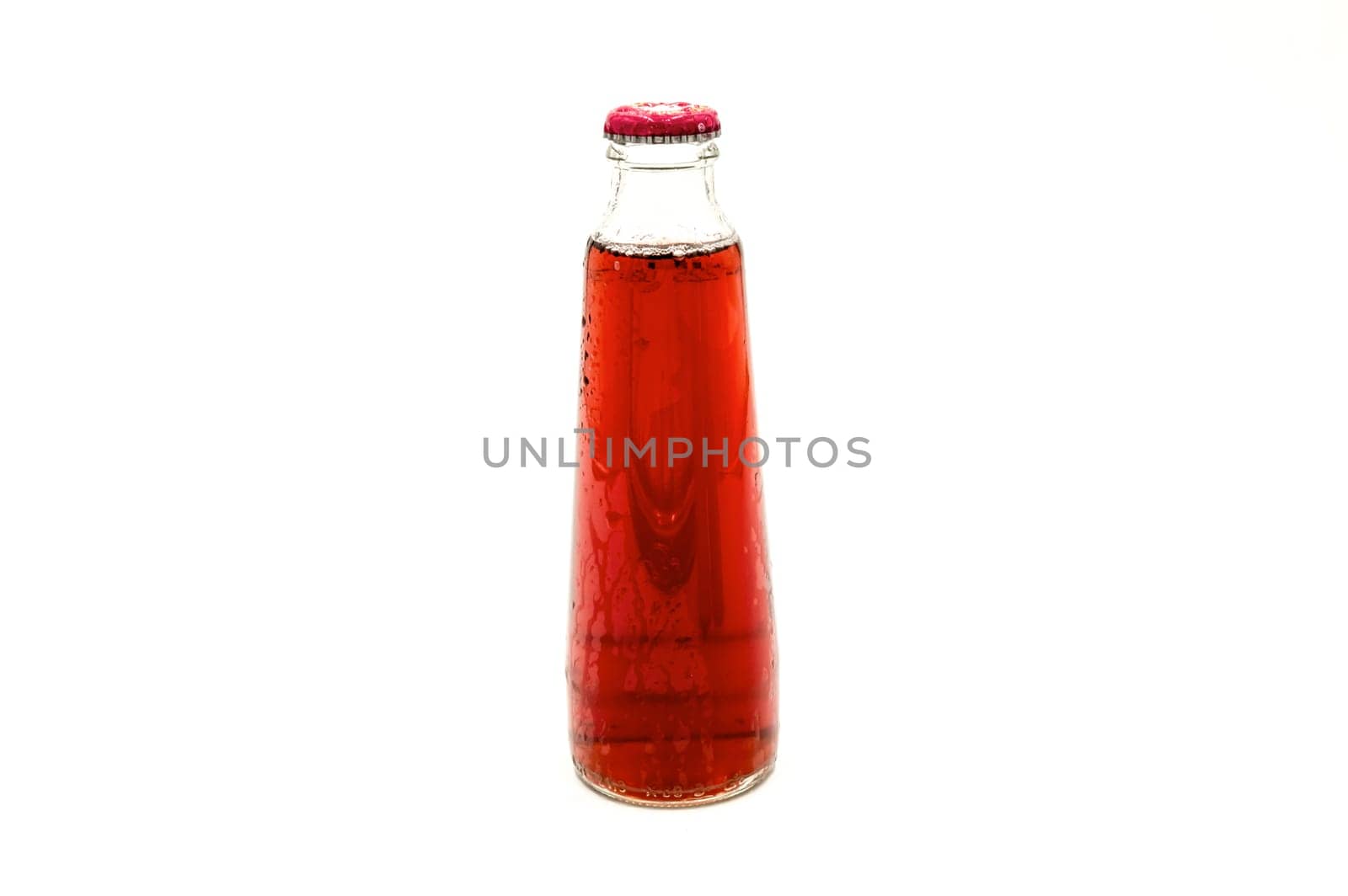 Bottles of cherry juice isolated on white background