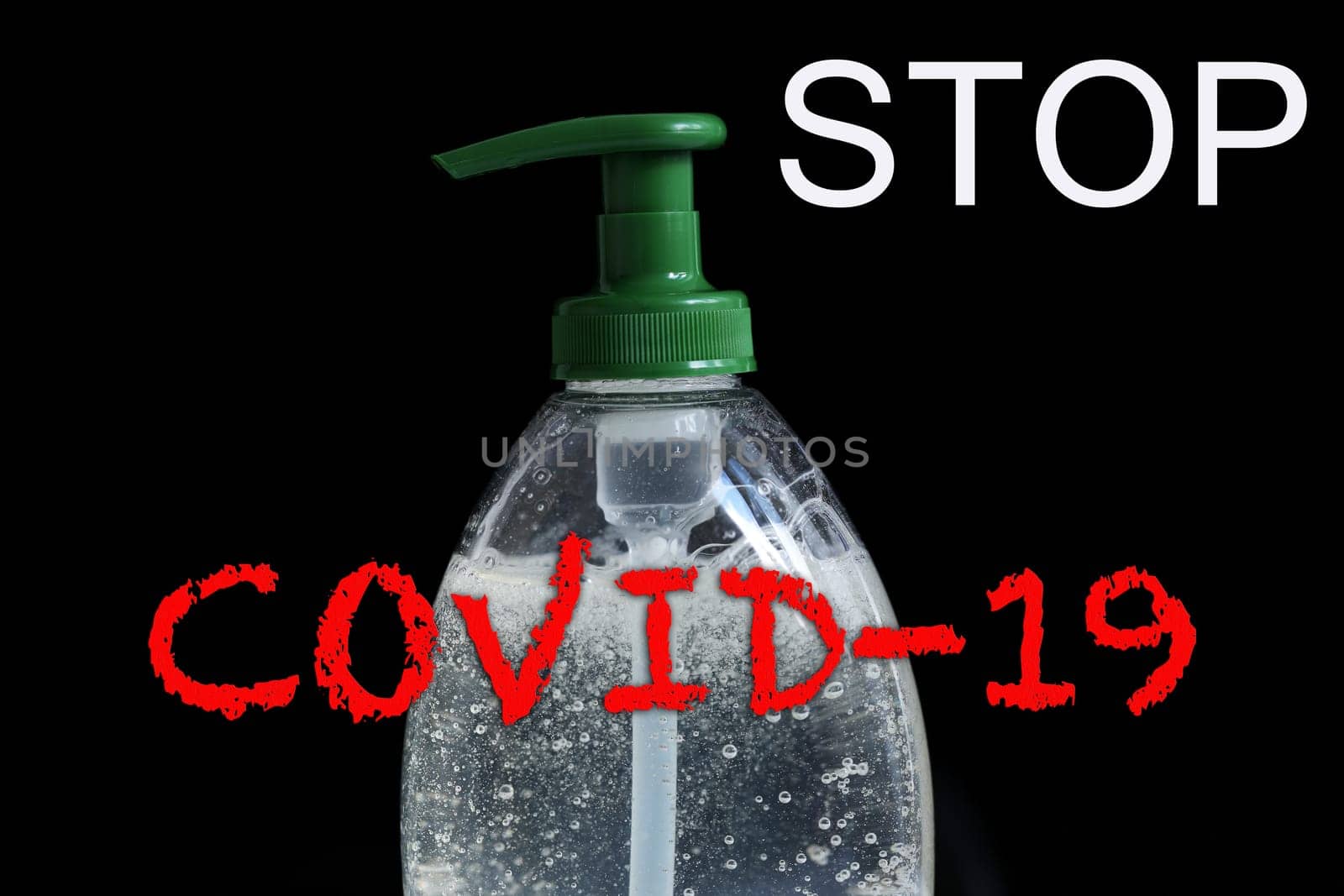 STOP COVID-19 Text, Clean Your Hands Often, Infection Prevention Coronavirus Concept, Rising Soap Bubbles In Pump Bottle On The Black Background. Close Up / Macro Shot