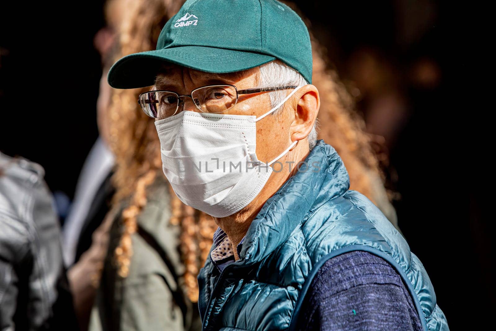 SEVILLE, SPAIN  - March 7: Unidentified man wearing mask to protect himself and others from coronavirus. March 7, 2020 in Seville, Spain.