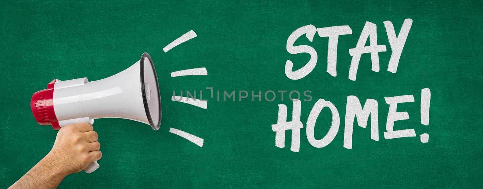 A man holding a megaphone - Stay home