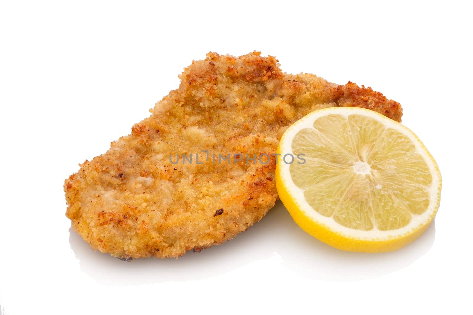 Veal escalope with panade and lemon white isolated