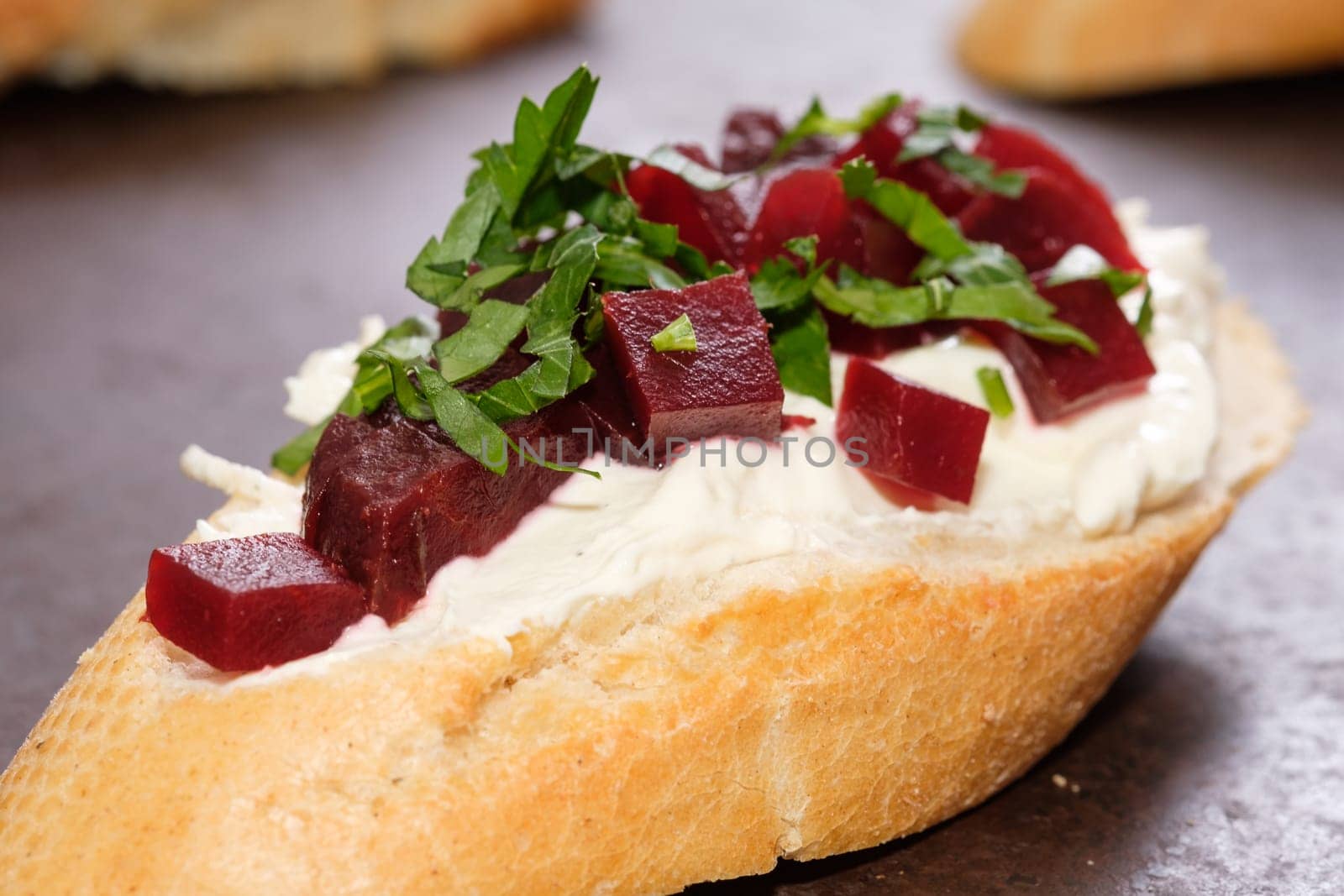 Beetroot horesraddish and farmers cheese on a bruschetta bread
