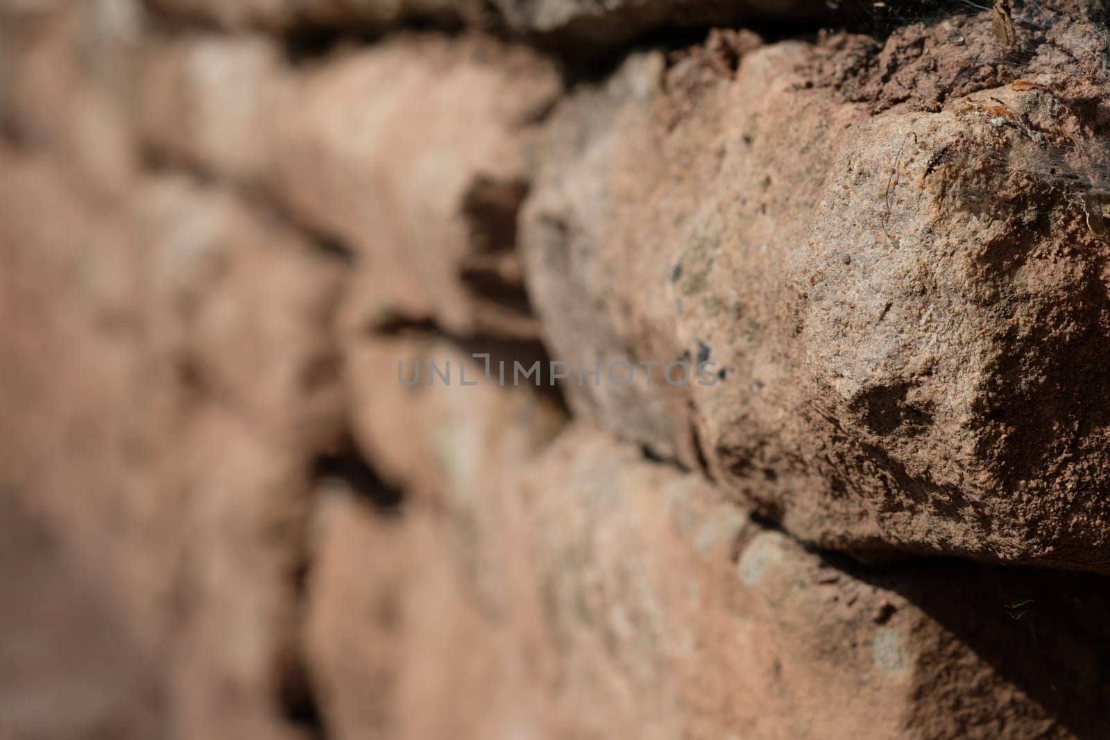 Stone wall old masonry close-up