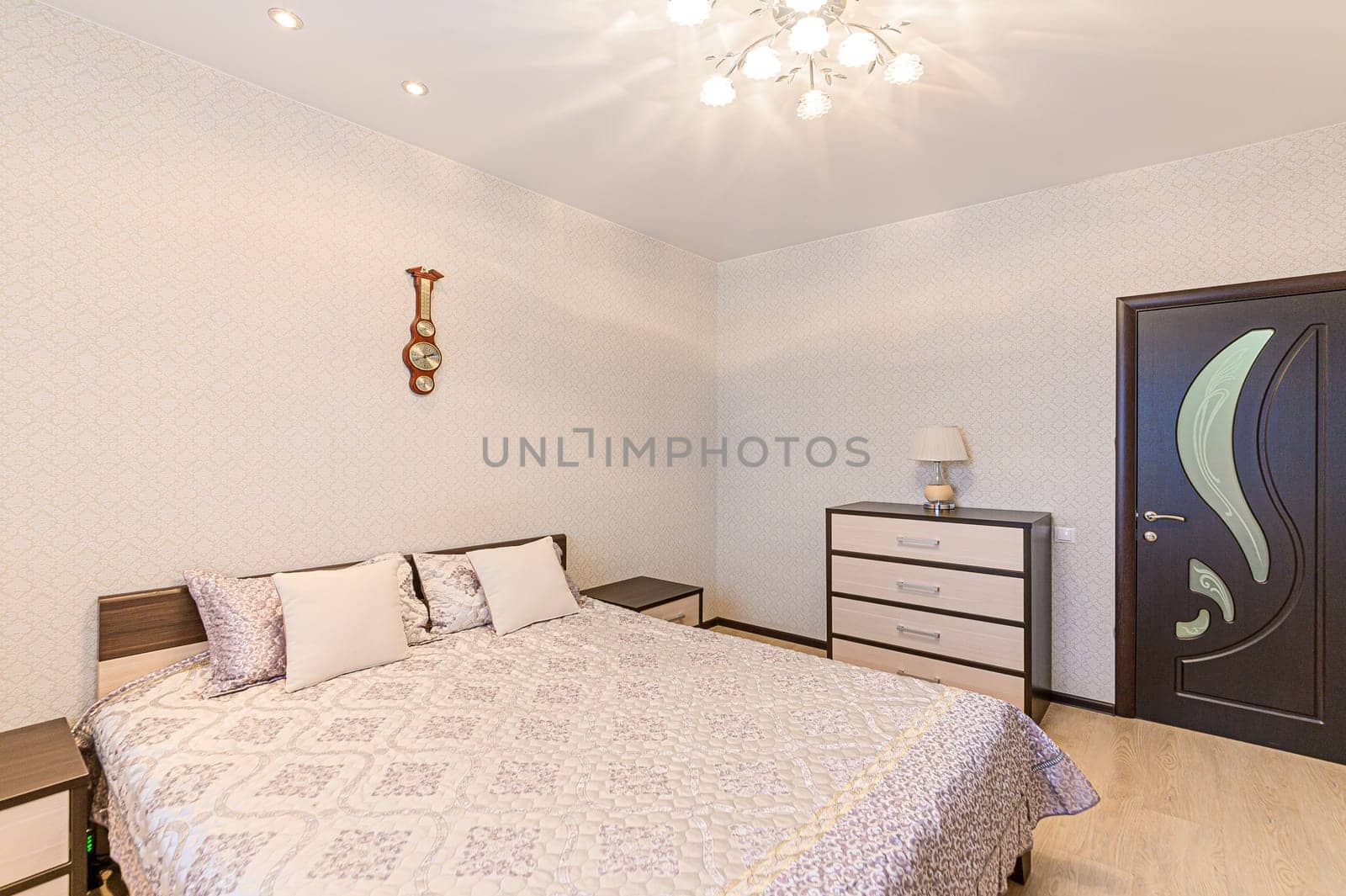 Russia, Moscow- December 05, 2019: interior room apartment modern bright cozy atmosphere. general cleaning, home decoration, preparation of house for sale. bedroom with bed