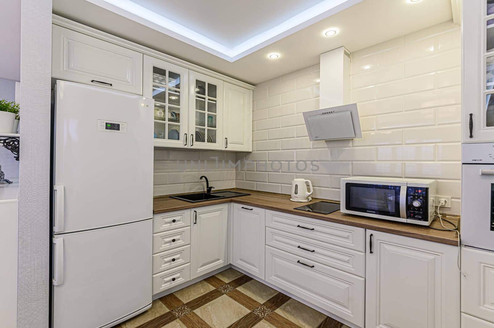 Russia, Moscow- December 05, 2019: interior room apartment modern bright cozy atmosphere. general cleaning, home decoration, preparation of house for sale. modern kitchen, dining area