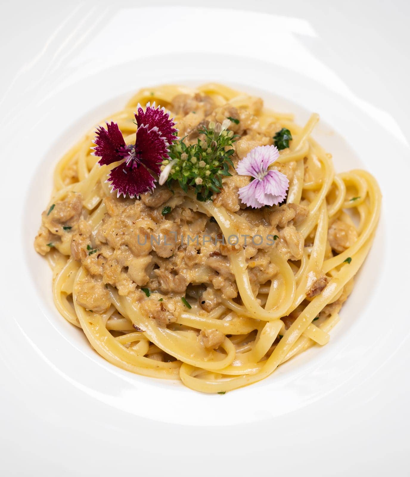 Spaghetti Cabonara pasta meat sauce with cream parmesan cheese, gourmet italian and mesiterranean cuisine recipe for food and drink industry concept.