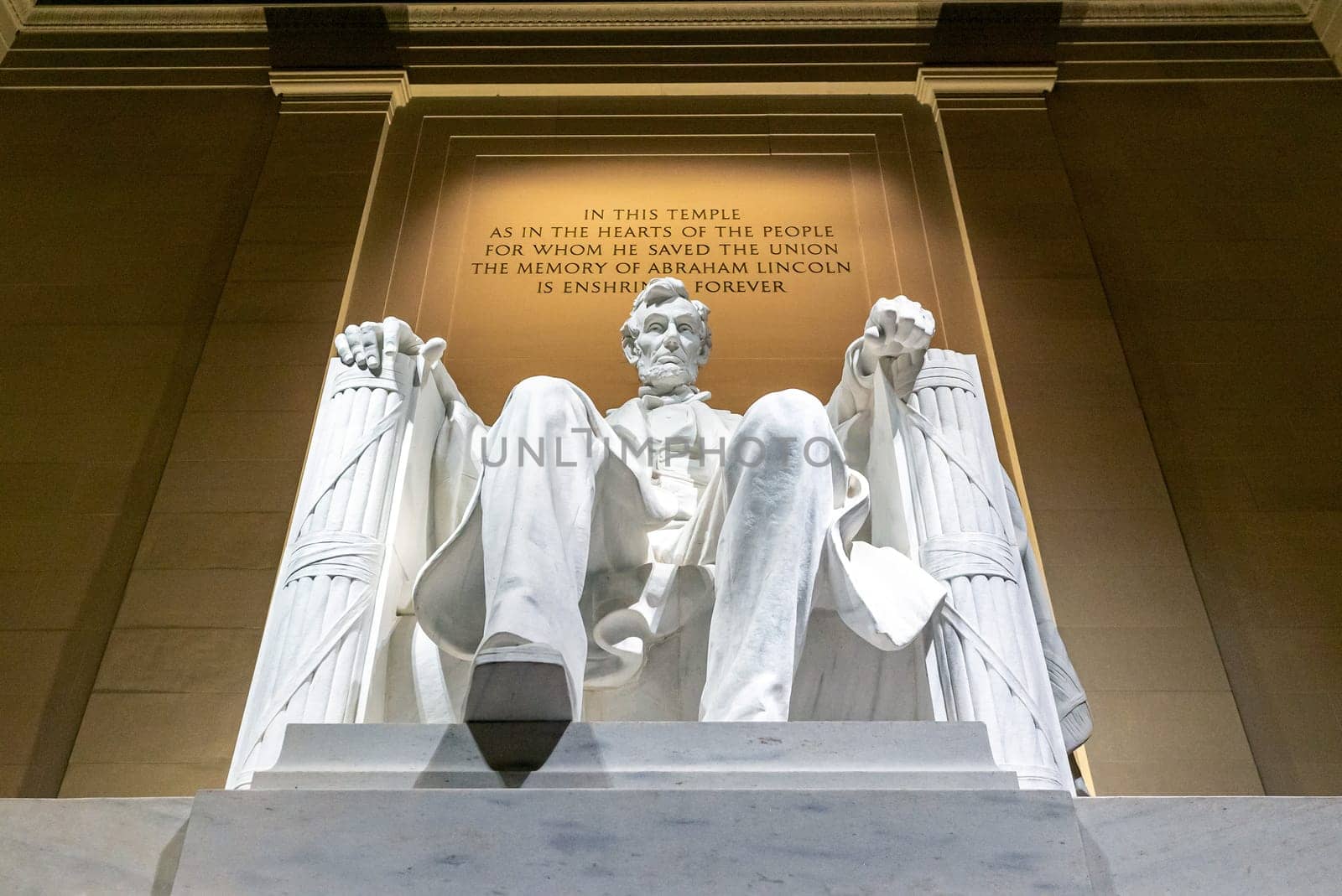 Lincoln Memorial statue in Washington DC USA at night. Lincoln Memorial is US national memorial located on the western end of the National Mall in Washington DC across from the Washington Monument.
