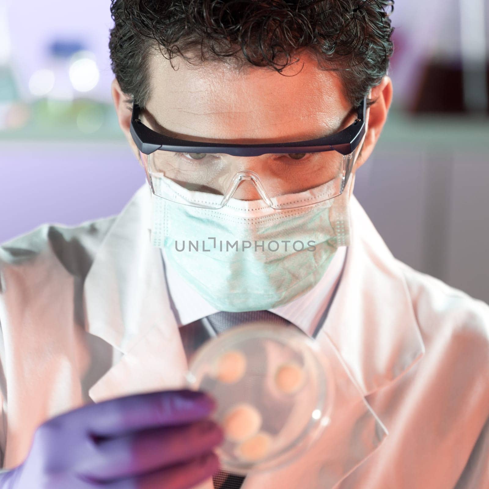 Scientist working in the corona virus vaccine development laboratory research facility. Corona virus pandemic concept. Development of virus treatment drug.