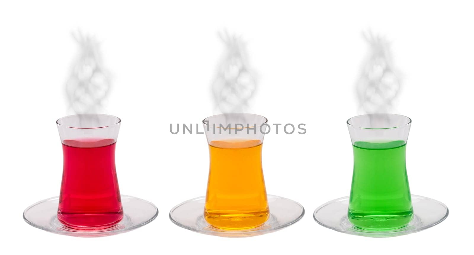 A glass of orange, green mint and red cherry tea on isolated white background.