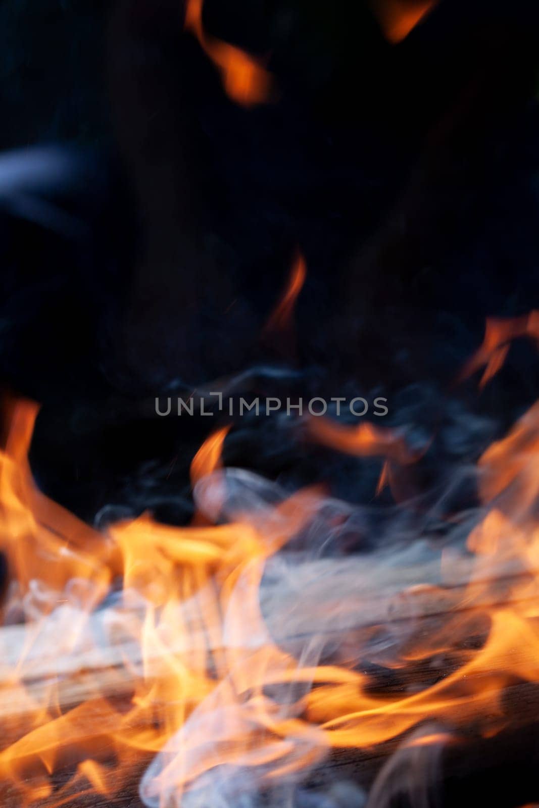 blaze fire flame texture background. A blurry photo of a fireundefined