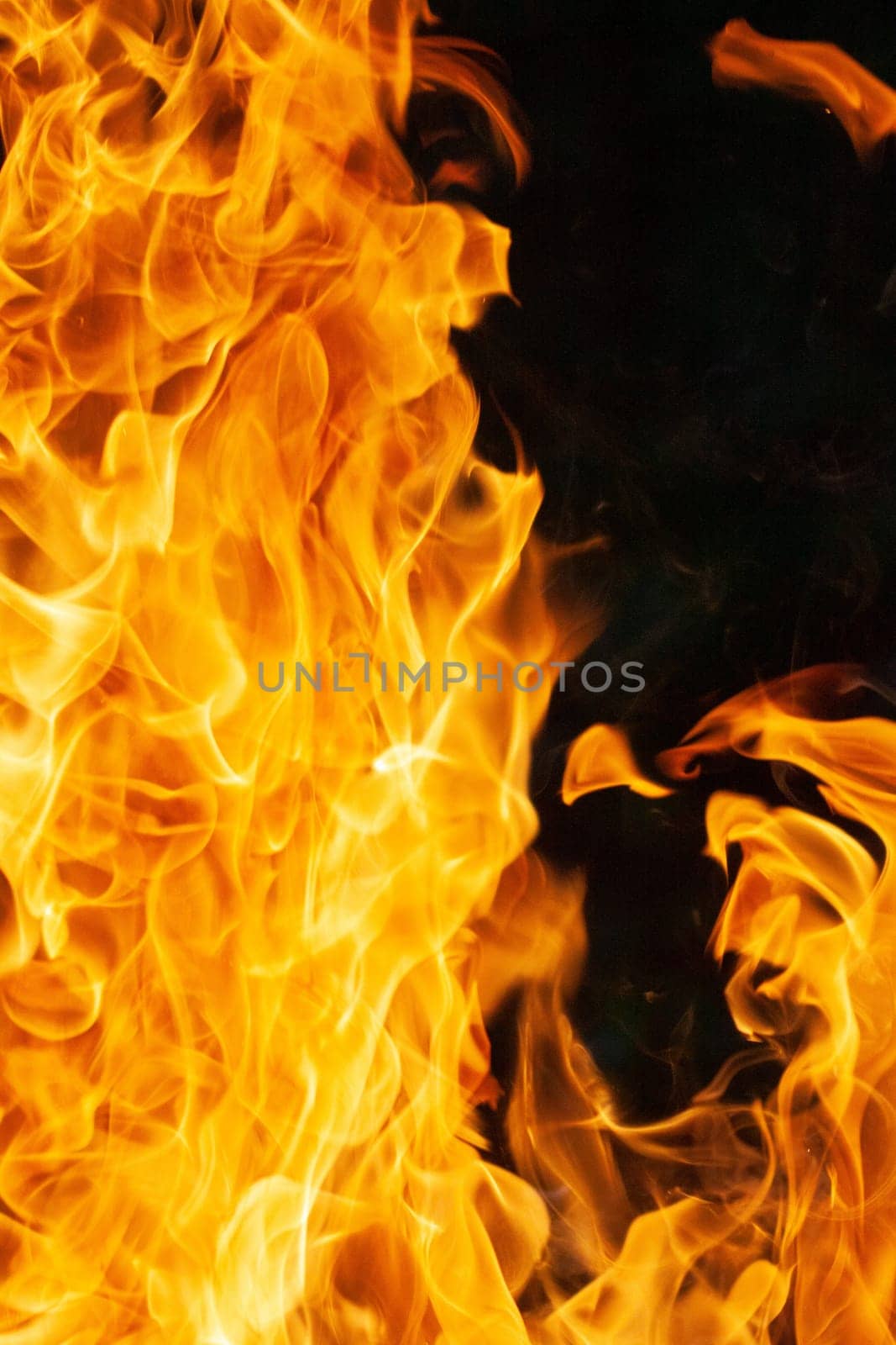 blaze fire flame texture background. A blurry photo of a fireundefined