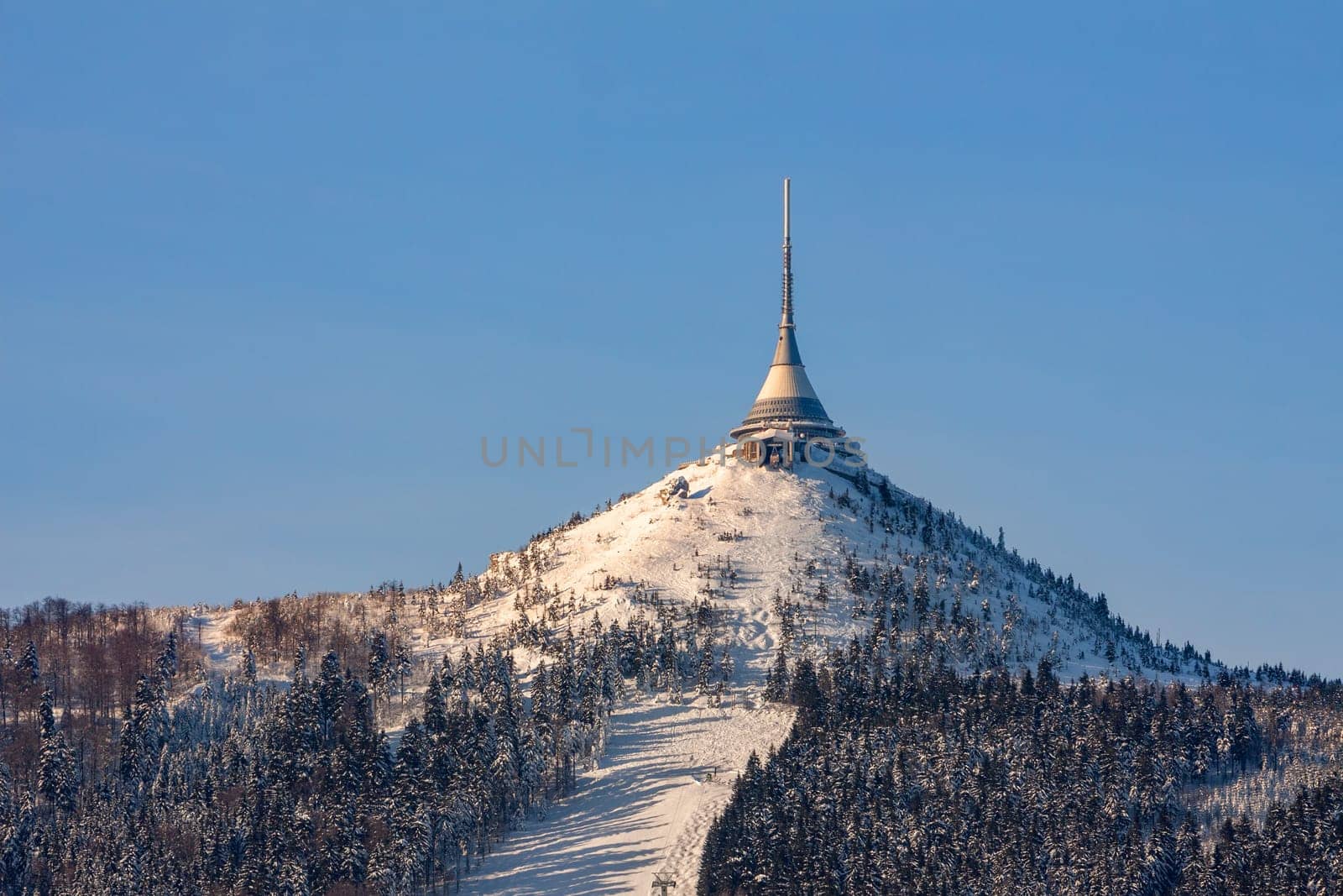 Czech Republic - Liberec - transmitter Jested in winter - beautiful sunny day. A large white buildingundefined