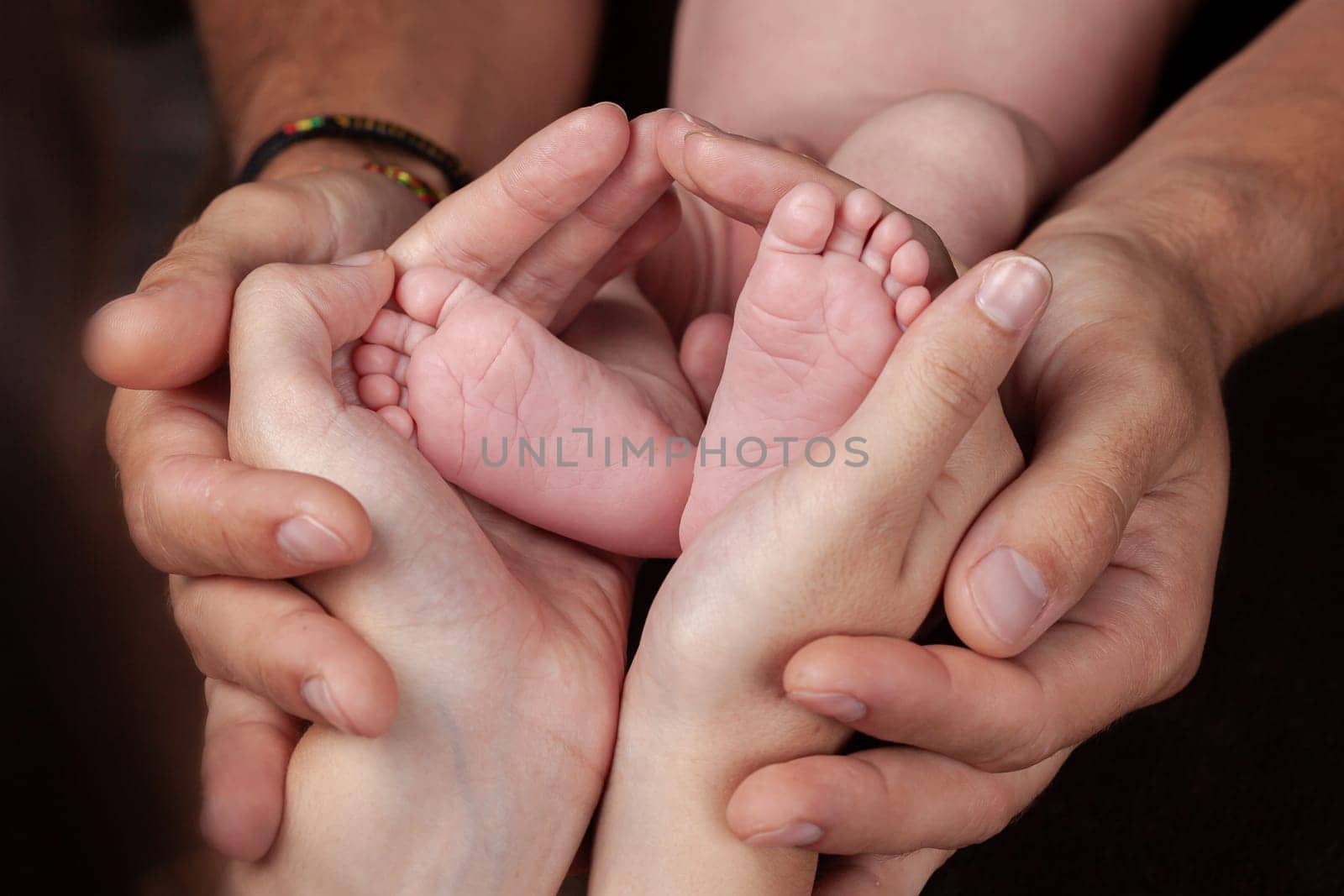 A close-up of tiny baby feet. High quality photo