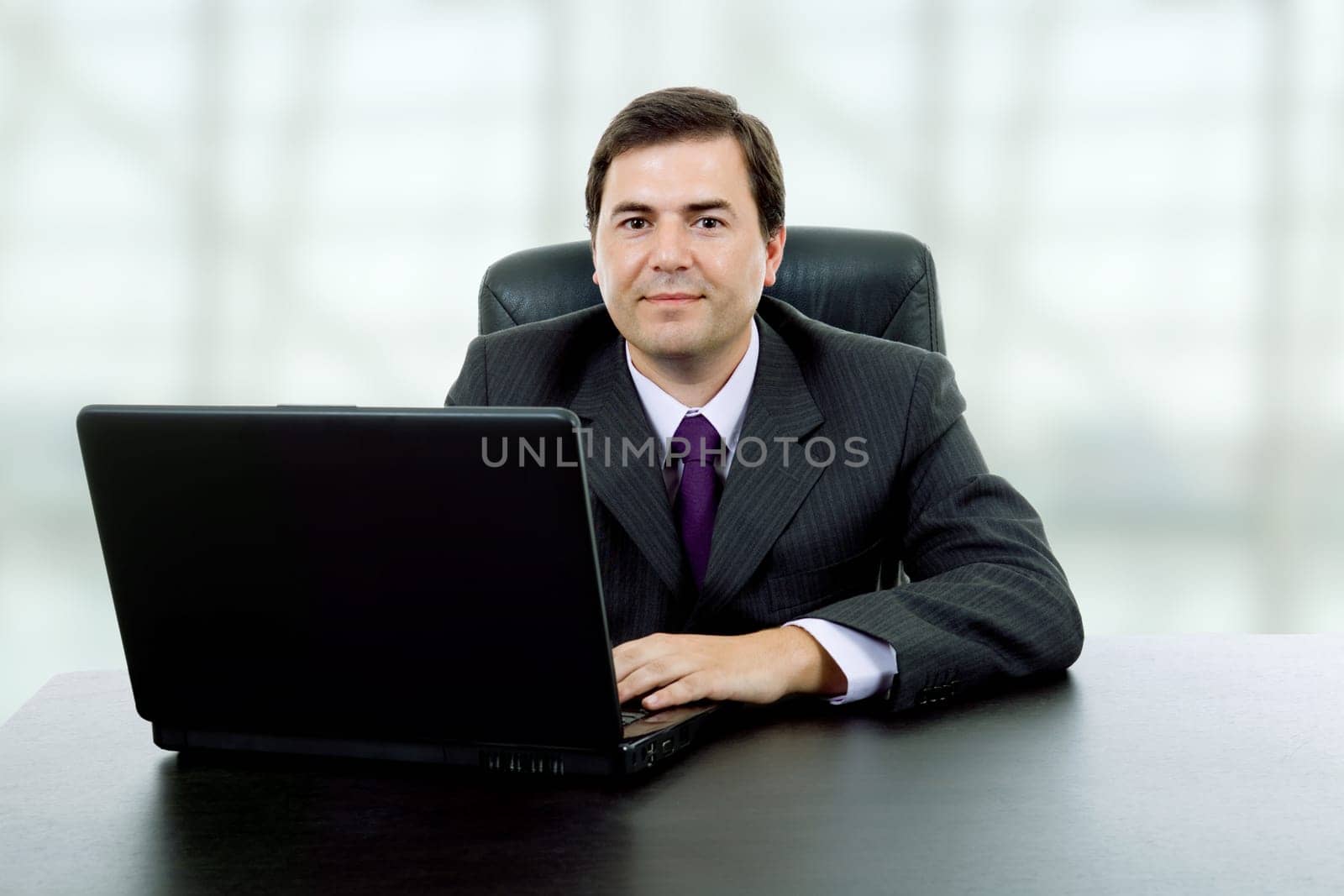 young business man working with is laptop