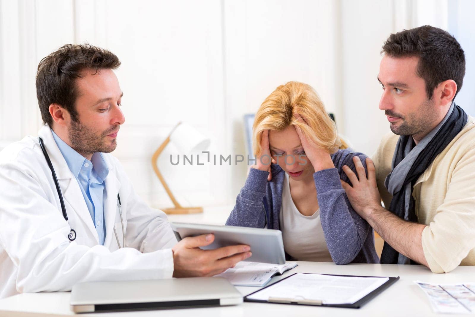 View of a Man goes with his girlfriend on her visits to the doctor