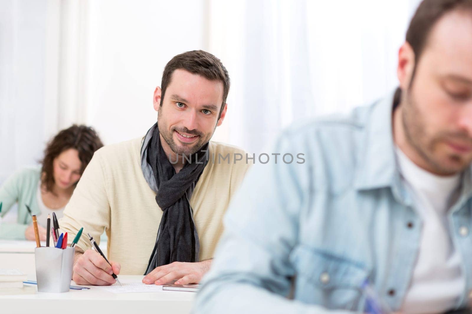 View of a Young attractive man taking competitive exam