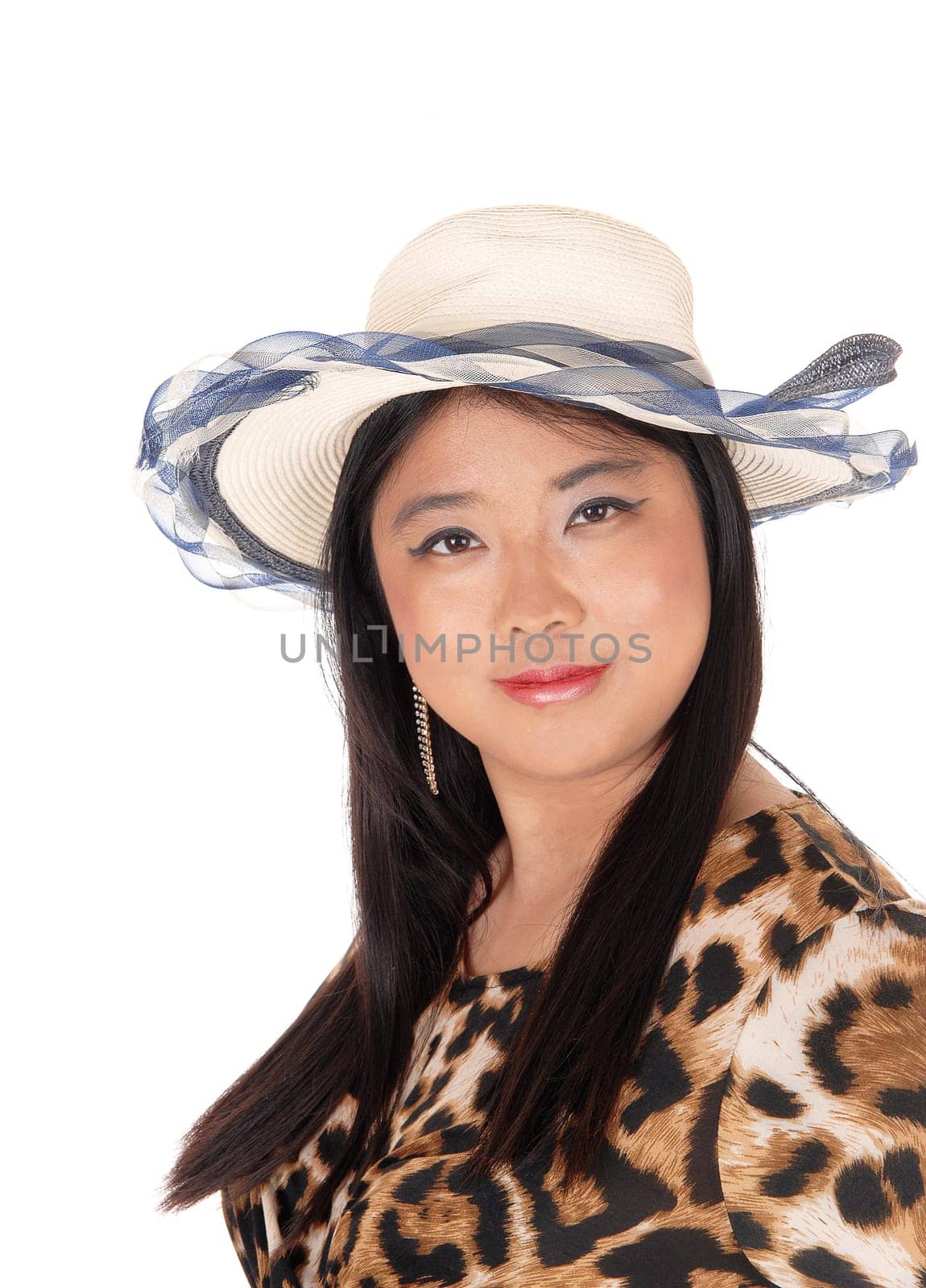 A beautiful young Asian woman standing in a dress and long black hair.with a summer hat, isolated for white background.