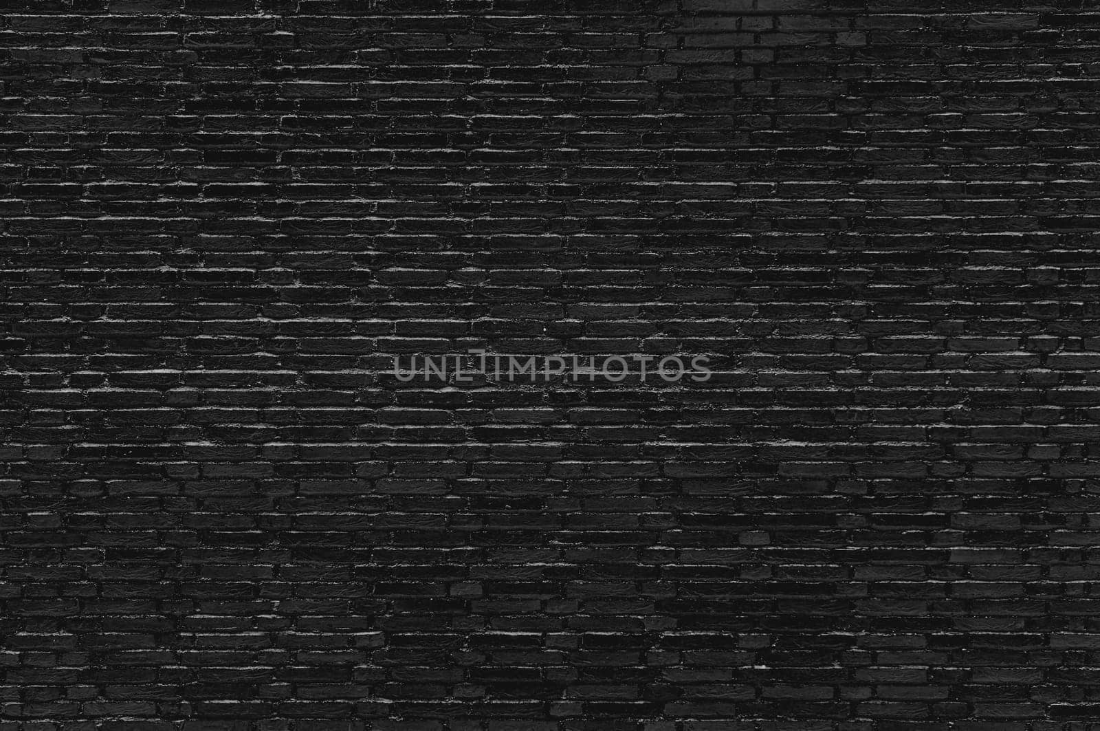 Black brick wall texture, dark background