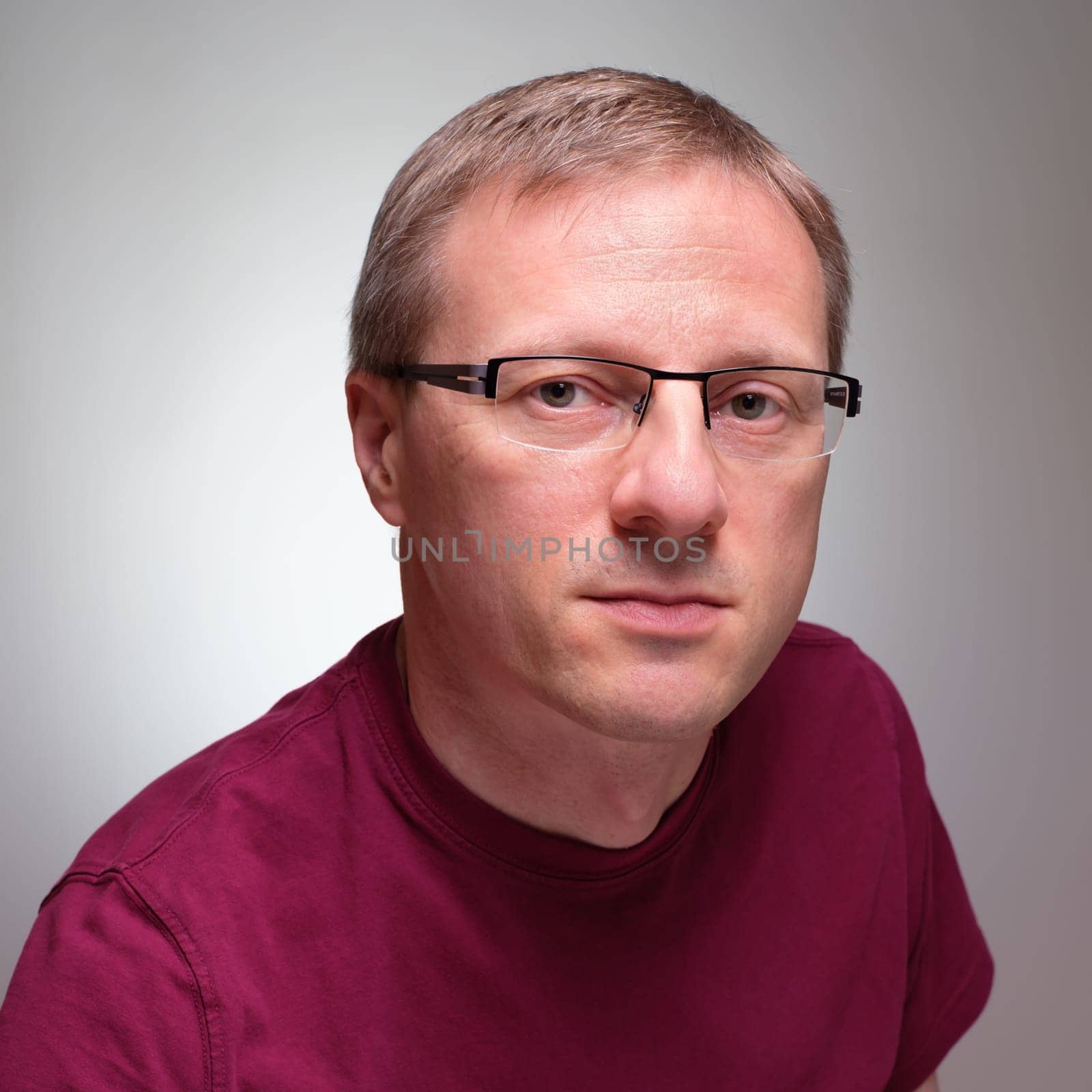 Portrait man with glasses studio light
