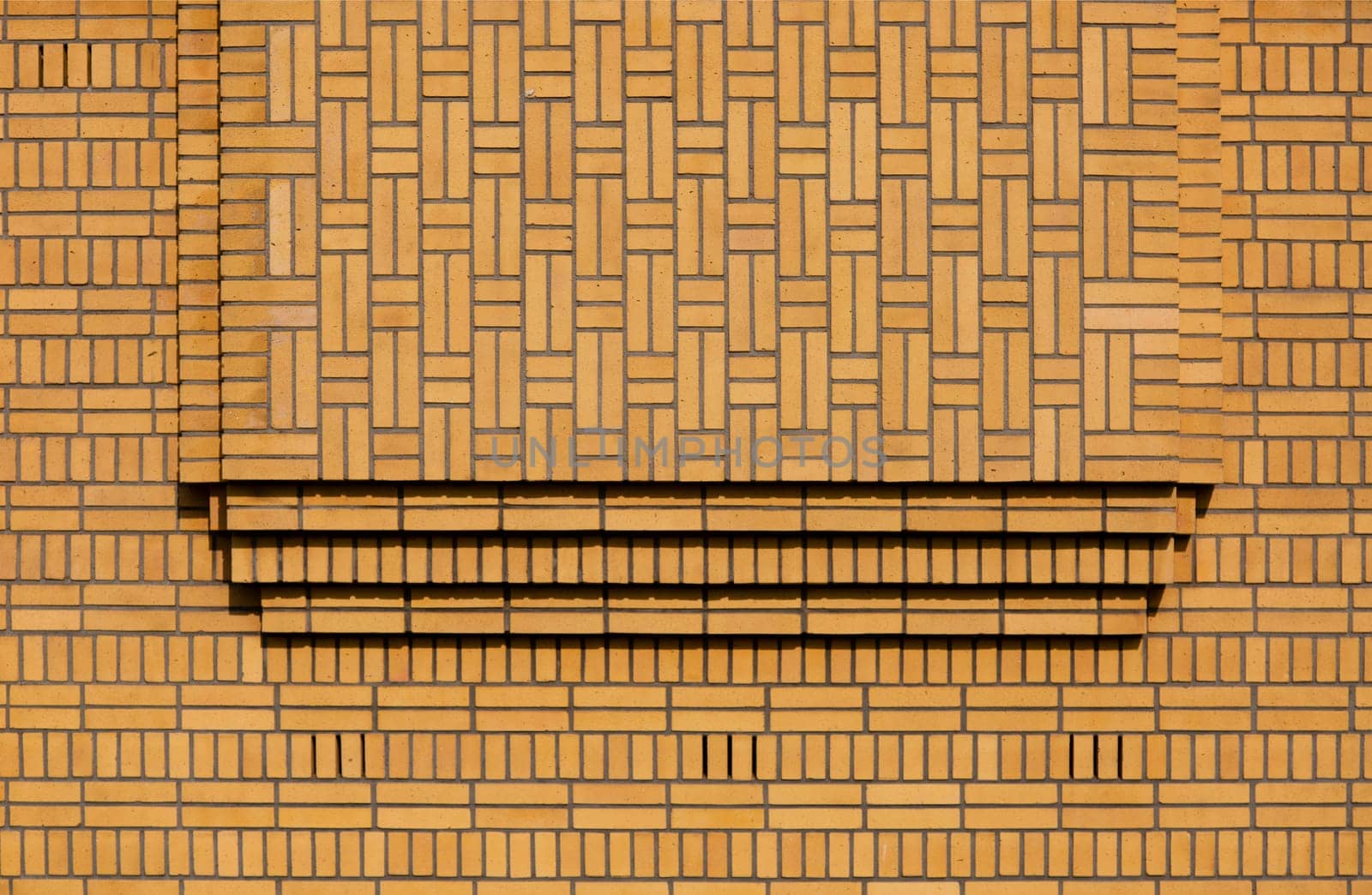..Brick wall of a building in art deco style..