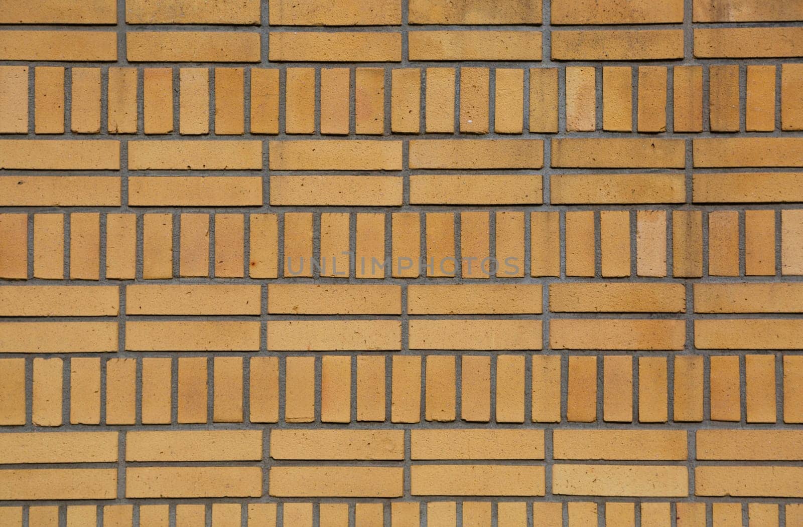 ..Brick wall of a building in art deco style..