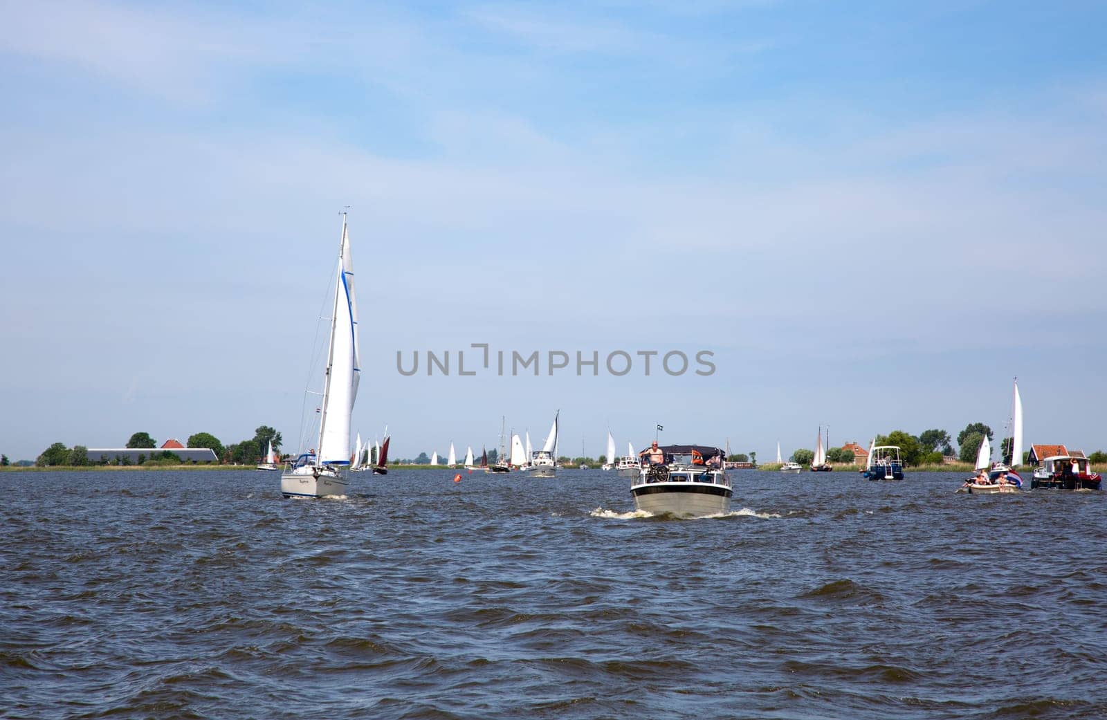 Heeg, Friesland, The Netherlands - June 2, 2019  Ships at the Heeger Lake in Heeg, Friesland, The Netherlands..