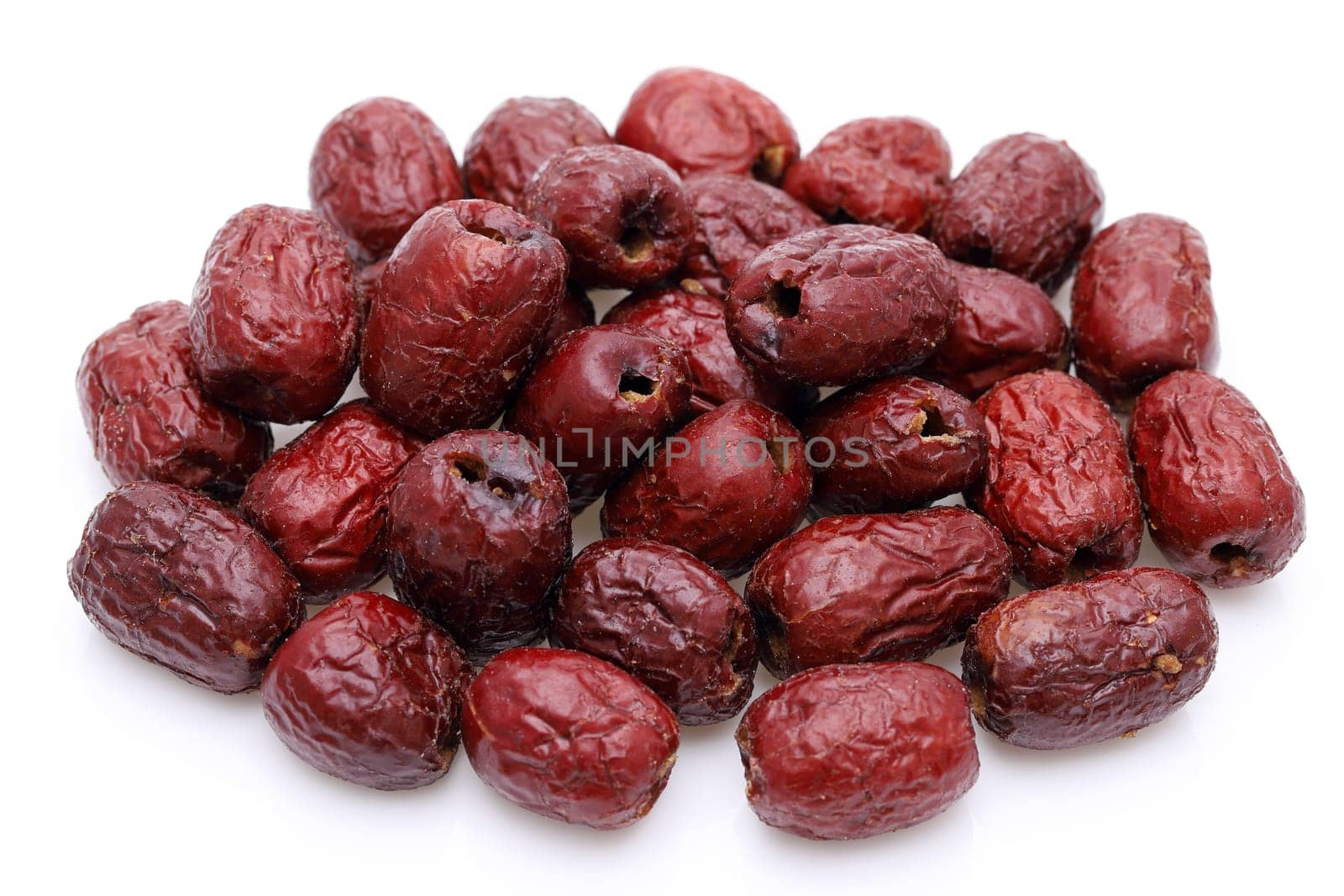 dried jujube fruits, chinese herbal medicine on white background
