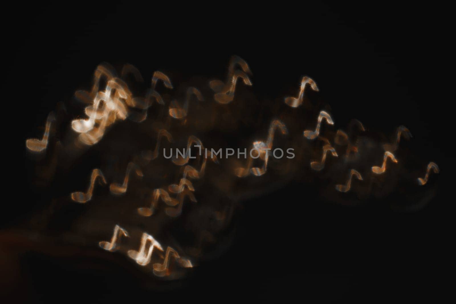 Gold notes on black background