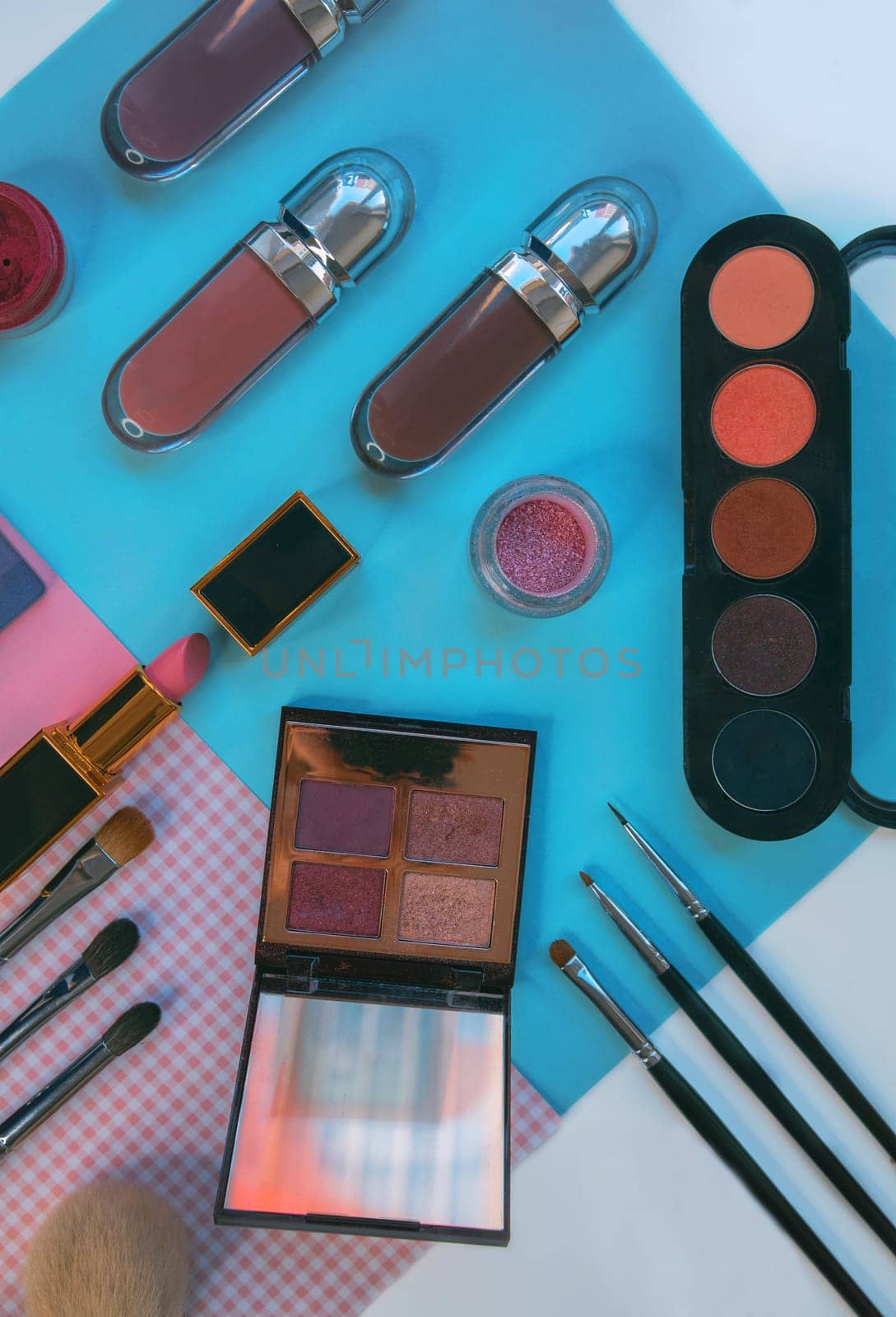 Set of decorative cosmetics on color background