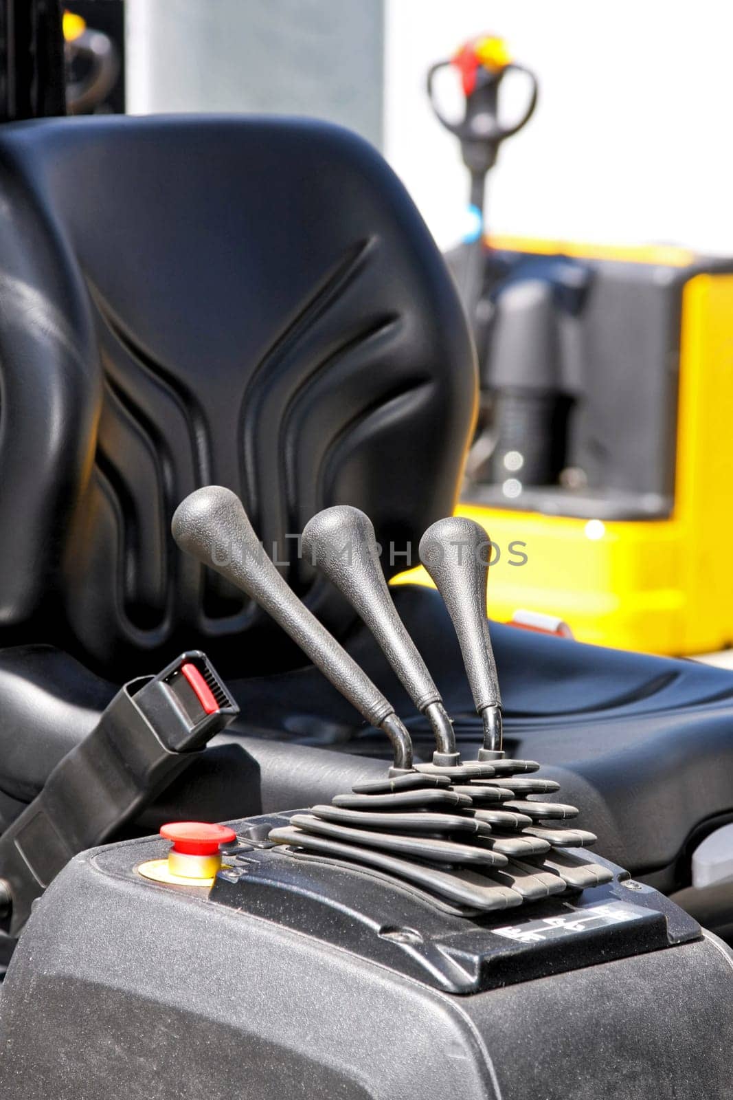 Close up shot of industrial machine controls.