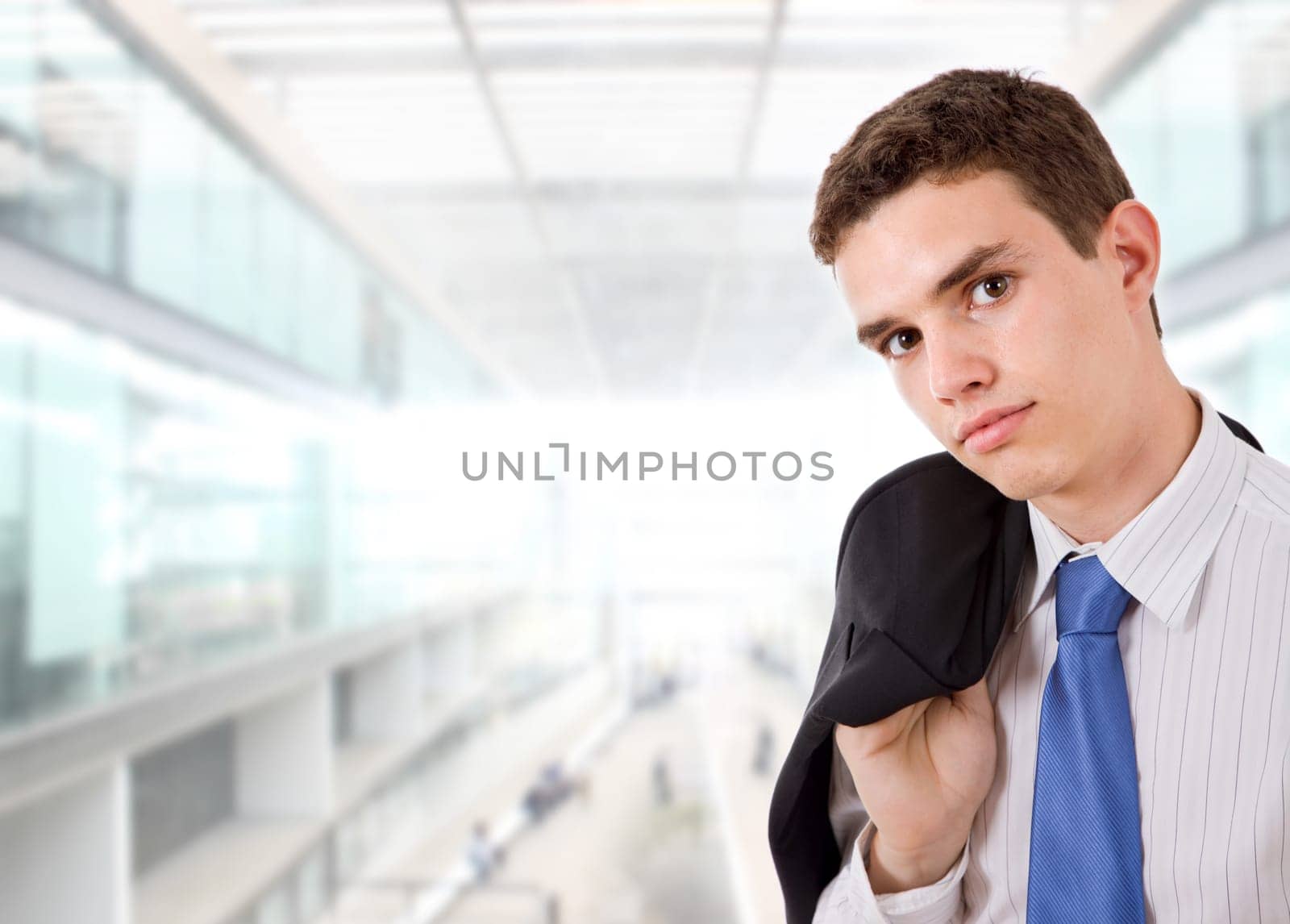 young happy business man at the office