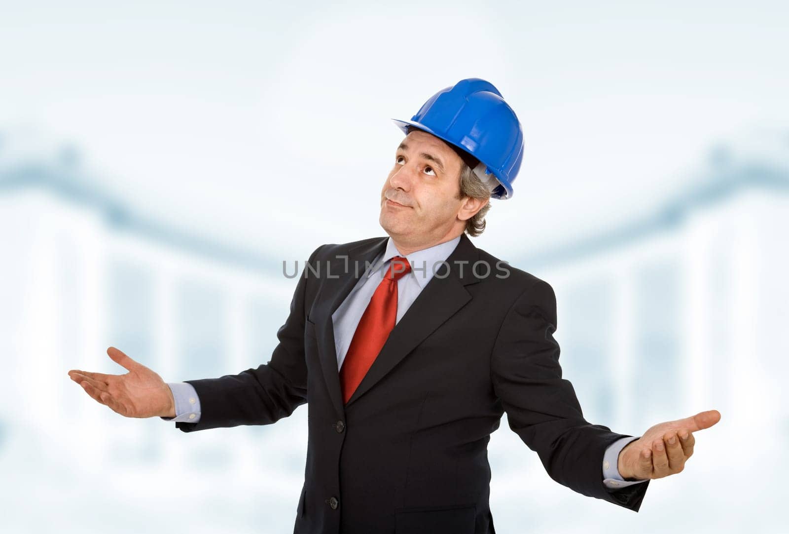 An worried engineer with blue hat with open arms