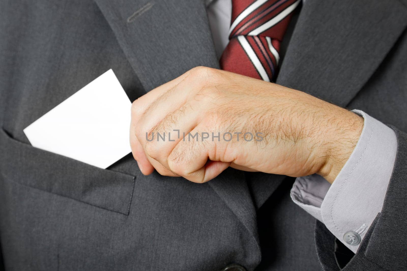 hand of business man with business card