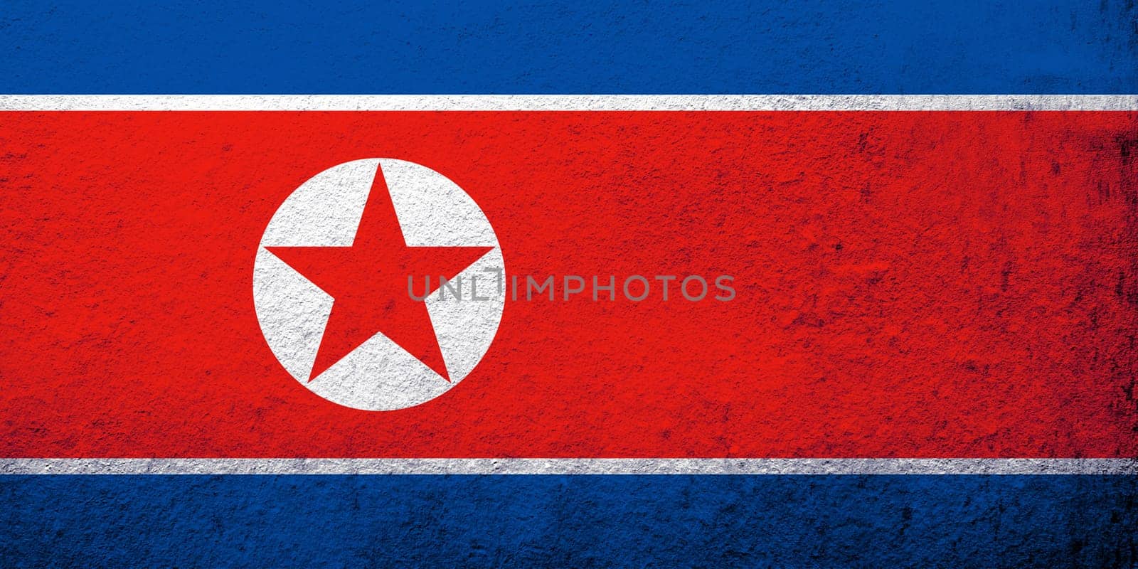 The Democratic People's Republic of Korea (North Korea) National flag. Grunge background