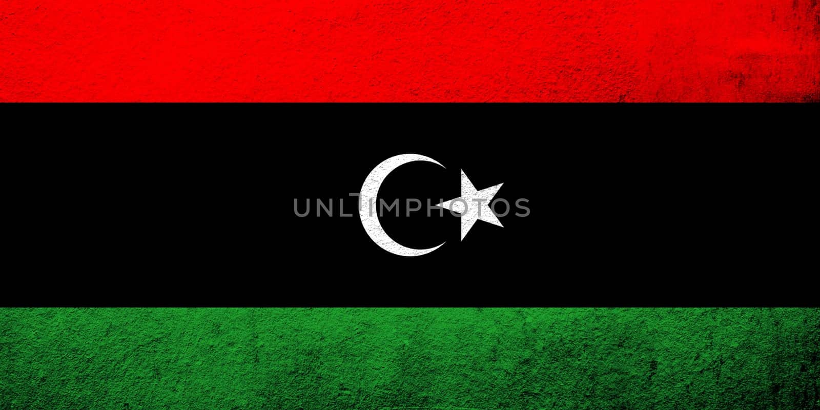 The State of Libya National flag. Grunge background