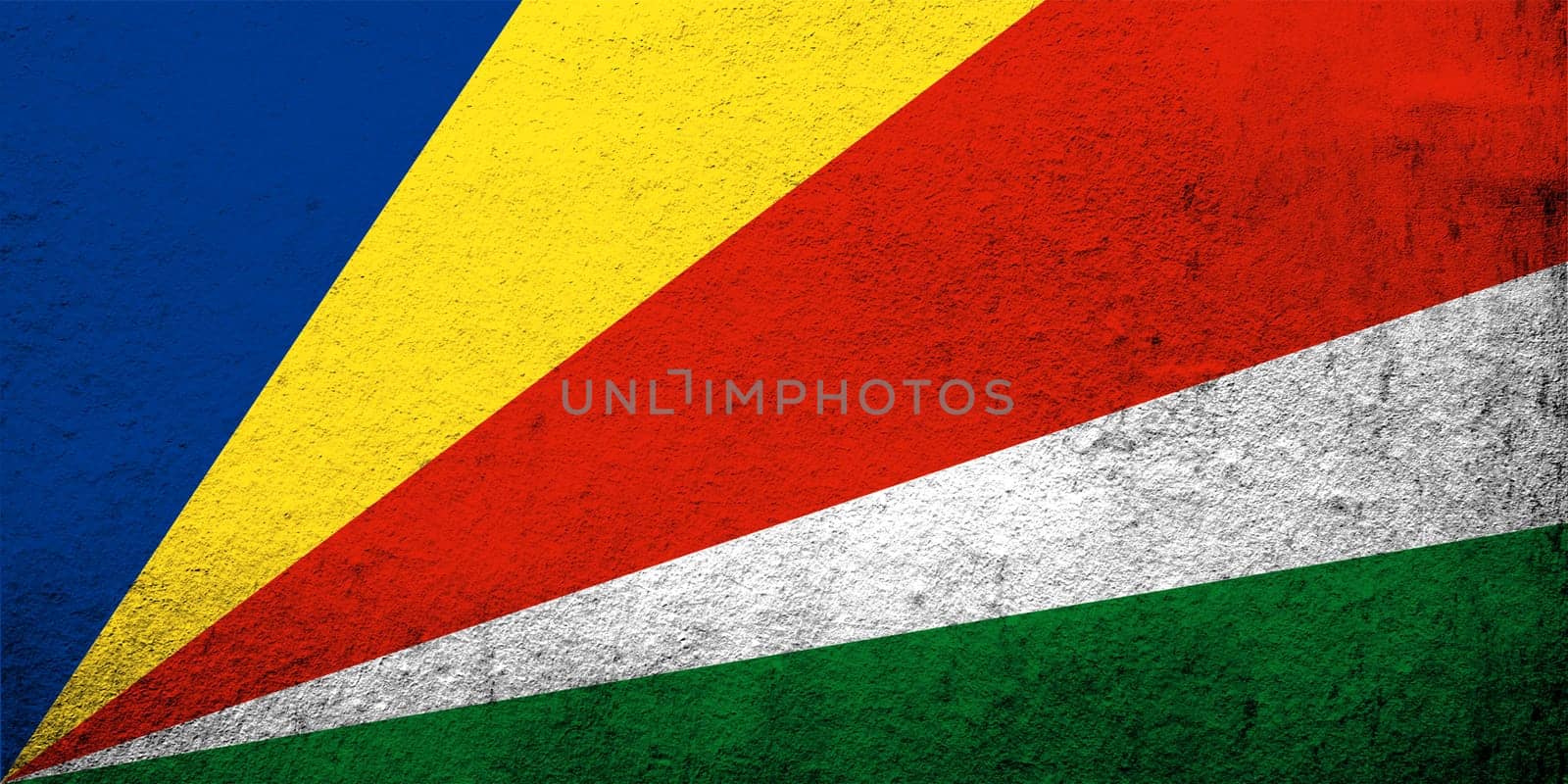 The Republic of Seychelles National flag. Grunge background
