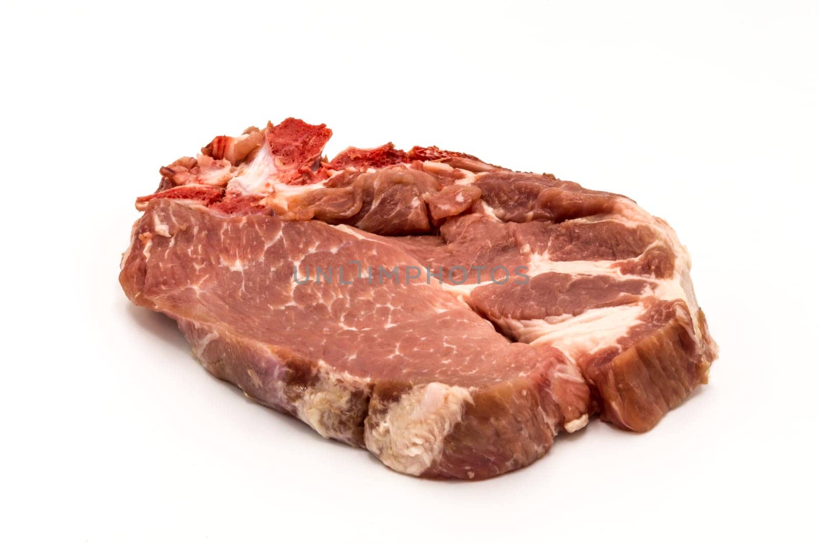 slices of raw pork isolated on white background. Top view. Flattening.