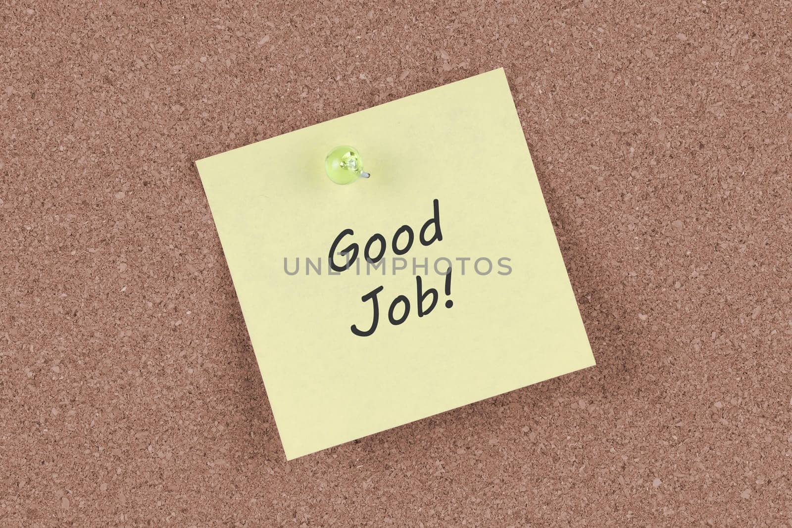 A Good Job post note on cork notice board