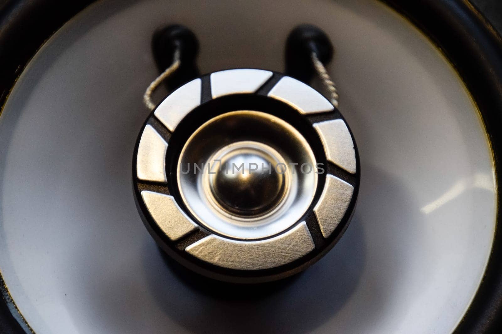 Combined car speaker, tweeter integrated in a large speaker.