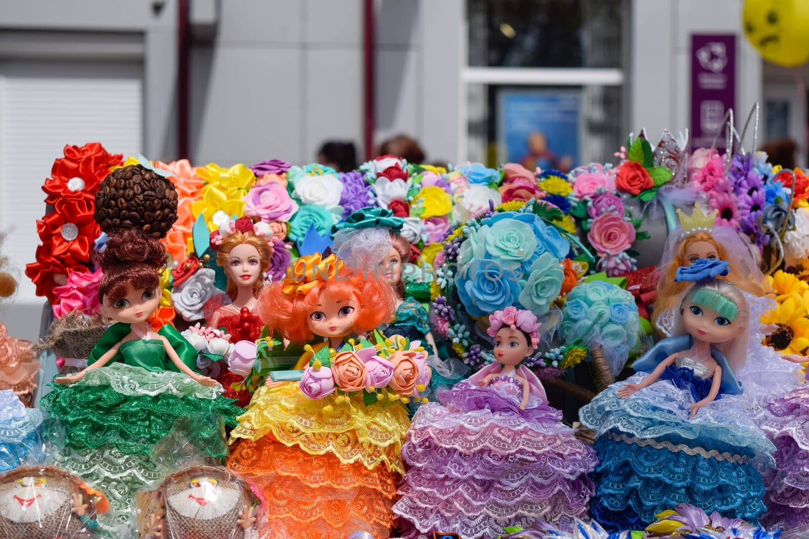 Krasnodar, Russia - May 1, 2019: Dolls girls in multi-colored dress. Dolls girls in multi colored dress