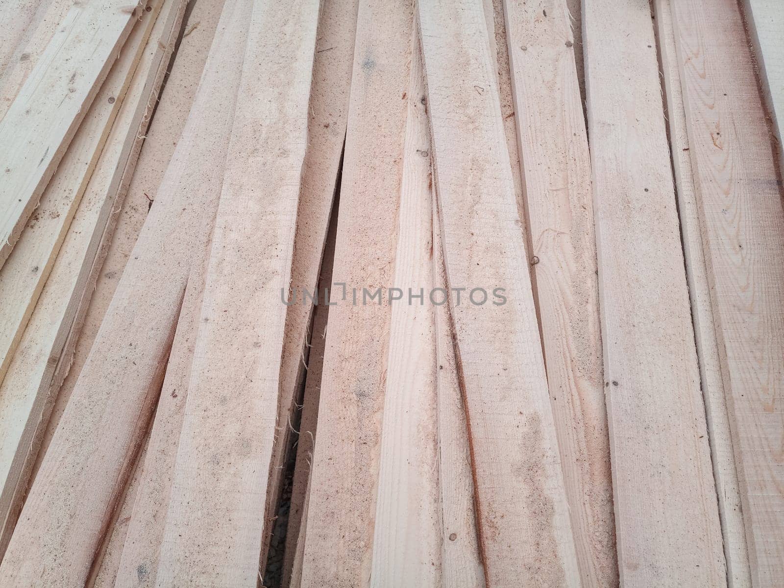 Boards with a sawmill. Building material from wood, boards for construction.