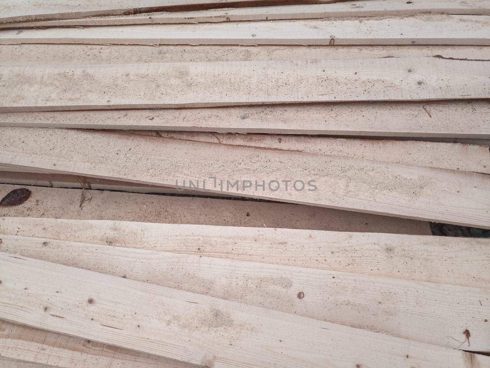 Boards with a sawmill. Building material from wood, boards for construction.