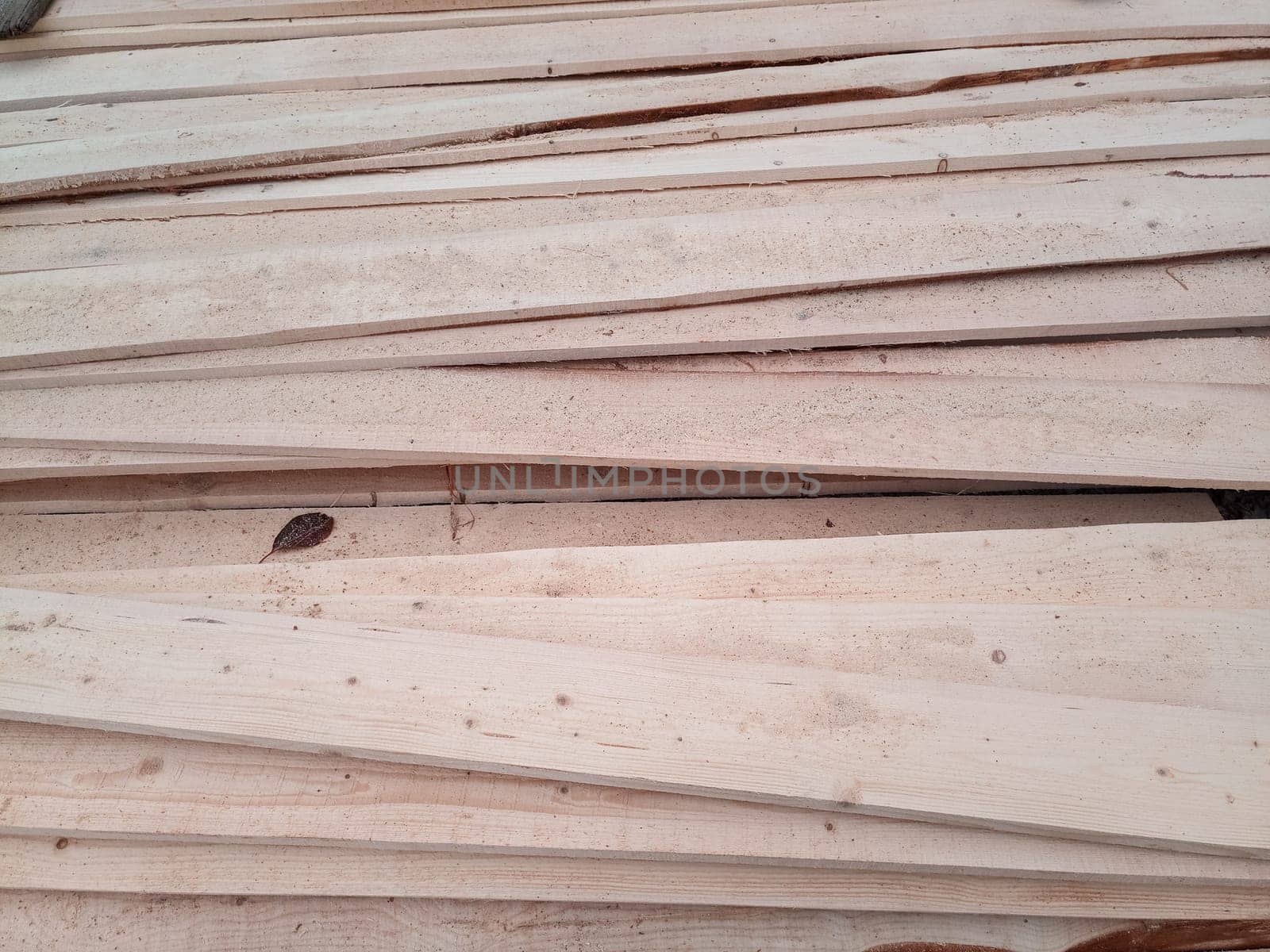 Boards with a sawmill. Building material from wood, boards for construction.