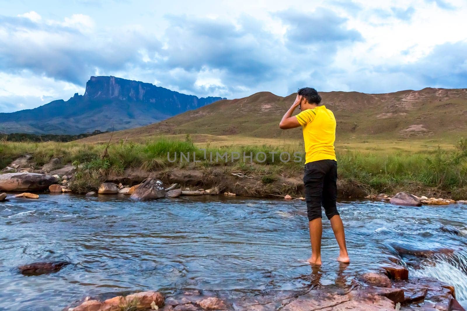 Man relaxing in nature. Mount Roaima, Venezuela.