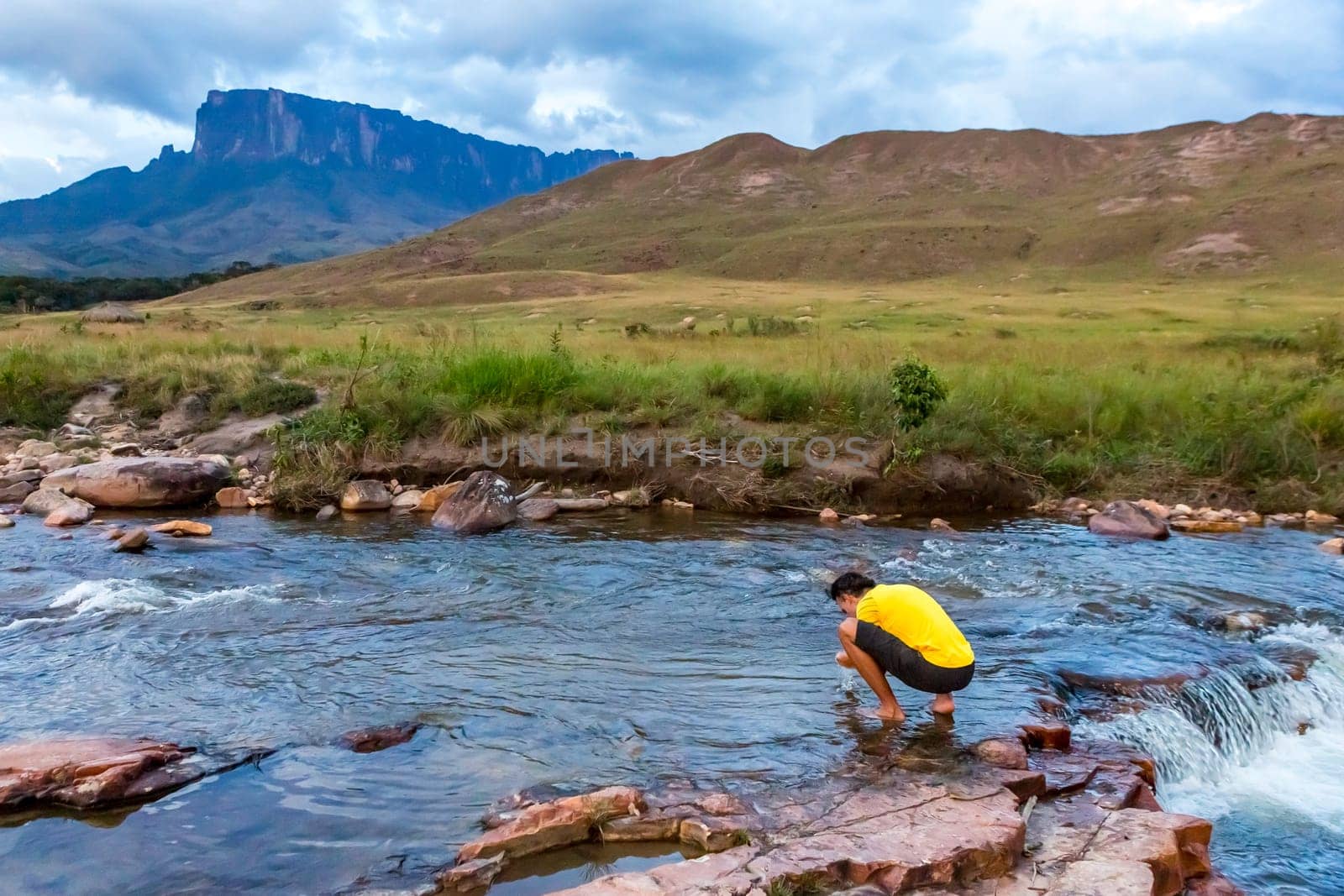 Man relaxing in nature. Mount Roaima, Venezuela.